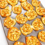 Mini apple pies bites with puff pastry and canned filling